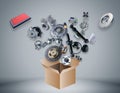 Many spare parts flying out of the box Royalty Free Stock Photo