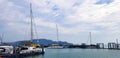 Many speed boats and yacht on the sea at port. Vehicle on ocean with blue sky and white cloud background Royalty Free Stock Photo