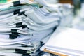 Many stacks of paper placed in the office. Royalty Free Stock Photo