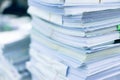 Many stacks of paper placed in the office. Royalty Free Stock Photo