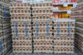 Many stacks of rows and paper packaging for chicken eggs, stacked in a store, brought from poultry farms in rural areas