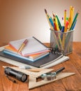 Many stationer on wooden table close-up Royalty Free Stock Photo