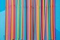 Many straws of red, blue, yellow and pink for drinks and cocktails at parties Royalty Free Stock Photo