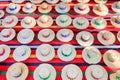 Many summer hats made of sisal ropes