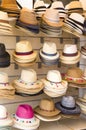 Many summer straw hats in shop