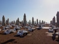 Many sunbeds on the sand beach and view to water of sea and blue sky in a nice day, morning or evening. The concept of a holiday Royalty Free Stock Photo