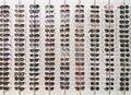 Many sunglasses in eyewear store, display on white wall Royalty Free Stock Photo