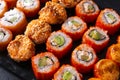 Many sushi , set of Japanese rolls California with caviar, Philadelphia with salmon, baked with cheese and eel