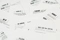 Many tax form blanks lies on table close up. Tax payers paperwork routine and bureaucracy concept Royalty Free Stock Photo