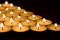 Many tea light candles Royalty Free Stock Photo