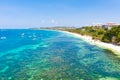 Many tourist boats near the island of Boracay. Seascape in the Philippines in sunny weather, view from above. Royalty Free Stock Photo