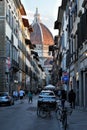 Many tourist on the street, near the cathedral Santa Maria del Fiore in Florence