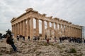 many tourists visit the Acropolis in Athens