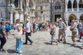 Many tourists visiting Piazzetta San Marco (St Marks Square) and Colonna di San Marco in Venice Royalty Free Stock Photo