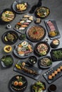 many traditional japanese food dishes variety on grey background Royalty Free Stock Photo