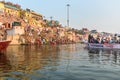 Many travelers on boat taking photos from the River Ganges in the morning. Varanasi. India