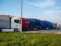 Many trucks on motorway service area Royalty Free Stock Photo