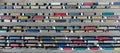 Many trucks with trailers stand in line to unload grain at the port. Royalty Free Stock Photo