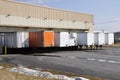 Many trucks unloading Royalty Free Stock Photo