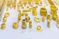 Many type and various of industrial casting and machining parts gold color or brass on table as thread connection joint nut Royalty Free Stock Photo