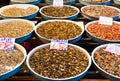 Many types of shellfish in large bowls at the market. The concept of sea food. Horiontal rintation.