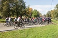 Many unidentified people on bicycles involved in urban cycling holiday