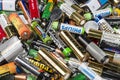 Many used AA and AAA sized batteries Royalty Free Stock Photo