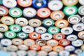 Many used batteries from different manufacturers. Old batteries for recycling Royalty Free Stock Photo