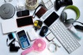 Many used modern Electronic gadgets for daily use on White floor, Reuse and Recycle concept Royalty Free Stock Photo