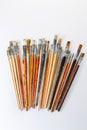 Many used paint brushes isolated on white background Royalty Free Stock Photo