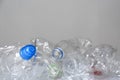 Many used plastic bottles against light background, space for text. Recycle concept Royalty Free Stock Photo