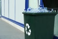 Many used plastic bottles in trash bin outdoors. Recycling problem Royalty Free Stock Photo