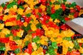 Many varied colorful candies for sale at the market. Kids and children sweet dessert mix treats
