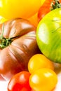 Many varieties of colorful tomatos