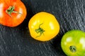 Many varieties of colorful tomatos