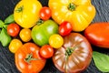 Many varieties of colorful tomatos