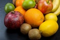 Many various fruits on a black background