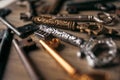 Many vintage keys in the defocus on a wooden background Royalty Free Stock Photo