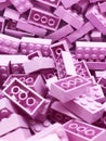 Many Violet plastic Lego blocks. Violet bricks.