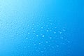 Many water drops on blue background Royalty Free Stock Photo