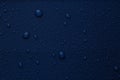 Many water drops on bright blue background Royalty Free Stock Photo