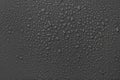 Many water drops on dark grey background Royalty Free Stock Photo