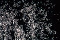 Many Water Drops Frozen In An Air On Dark Background