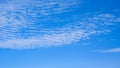 Many white fluffy Cirrocumulus clouds on blue horizon sky background in the morning, beautiful summer cloudscape sky Royalty Free Stock Photo