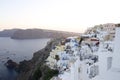 Many white houses in a cliff landscape in the volcanic Greek island of Santorini in the Oriental Mediterranean Sea Royalty Free Stock Photo