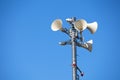 Many loudspeakers against cloudy blue sky Royalty Free Stock Photo