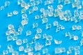 Many white silica gel on blue background Royalty Free Stock Photo