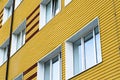 Many windows in yellow building Royalty Free Stock Photo