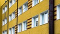 Many windows in yellow building Royalty Free Stock Photo