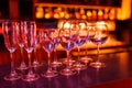 Many wine glasses on the bar with brilliance and light Royalty Free Stock Photo